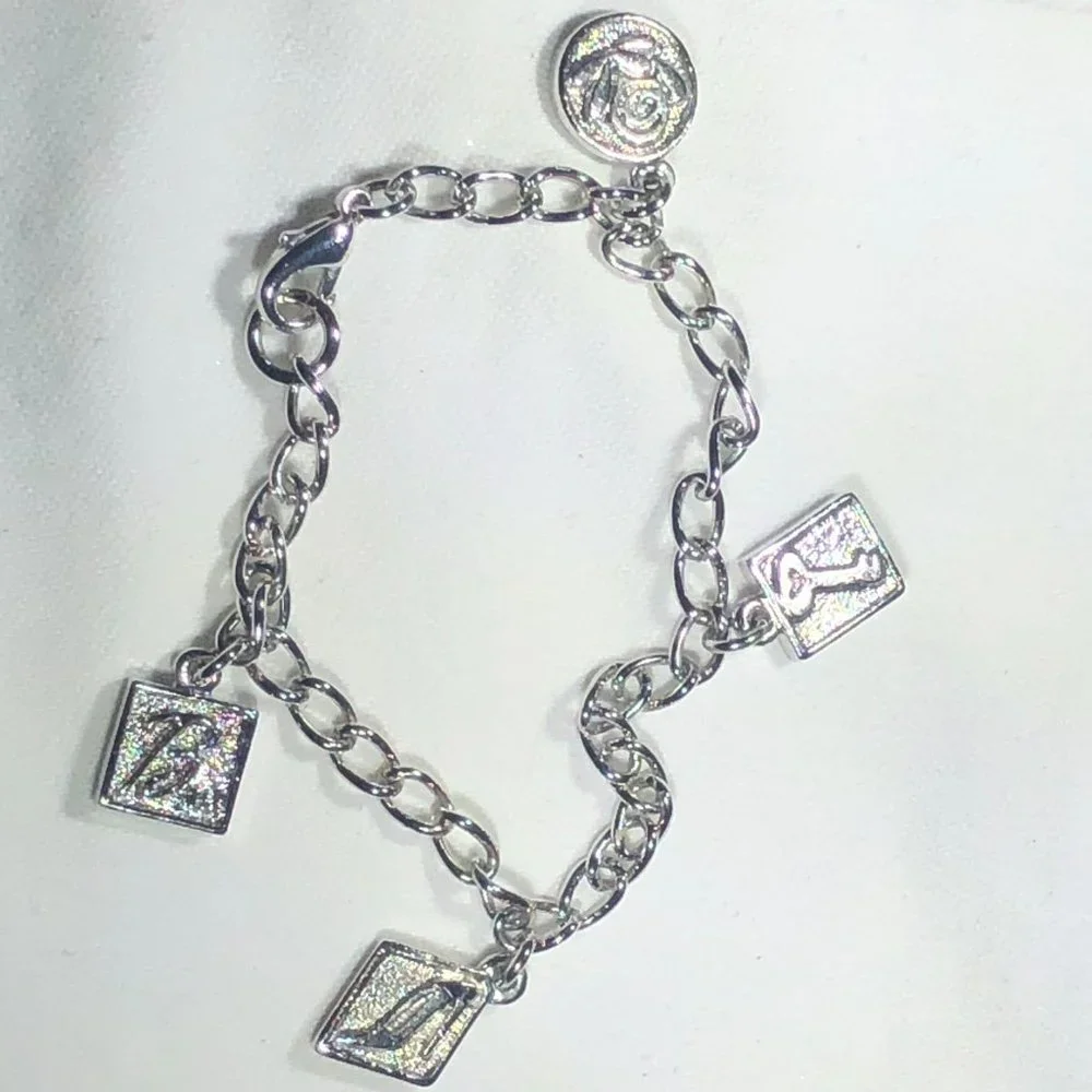SILVER TONE BARBIE CHARM BRACELET